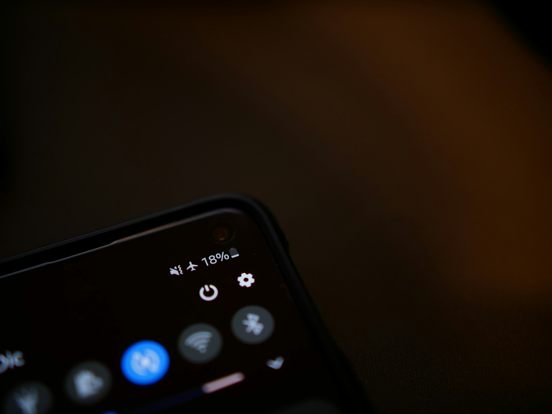 Smartphone screen showing airplane mode icon at the top of the display