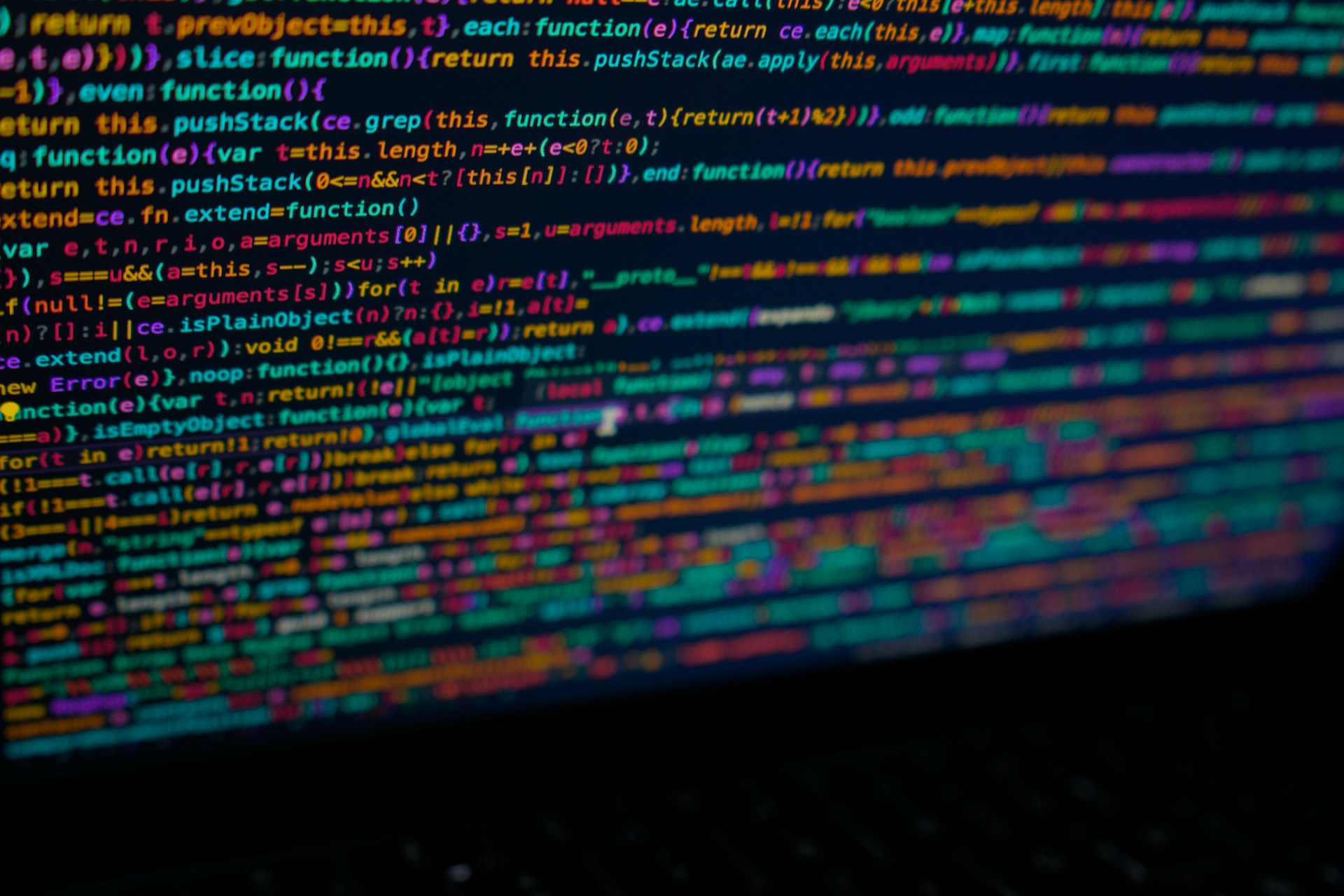 Close-up of a computer screen displaying lines of text and web content